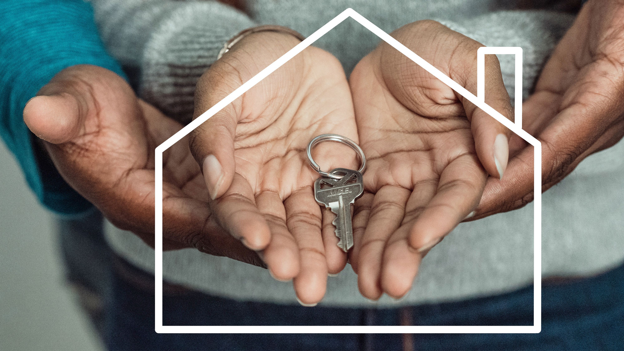 image of people holding house keys